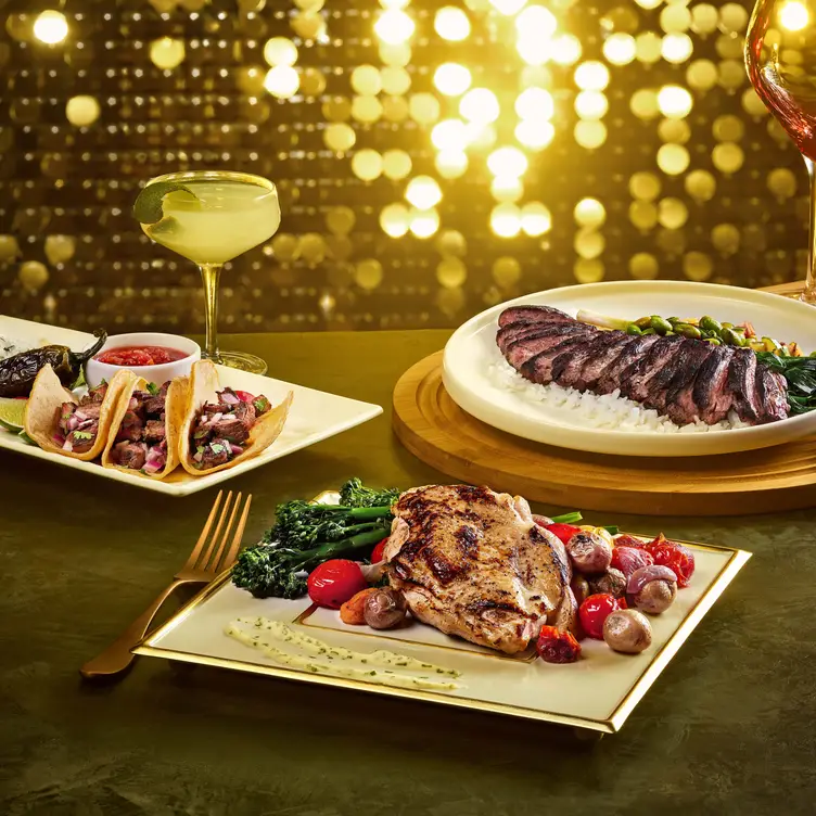 Street tacos, brick chicken, and grilled steak. - The Hollywood Rooftop Restaurant & Bar by Madame Tussauds, LOS ANGELES, CA