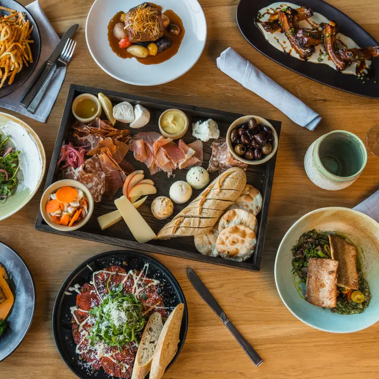 a table full of Brigade staple dishes. - Brigade，MTBozeman