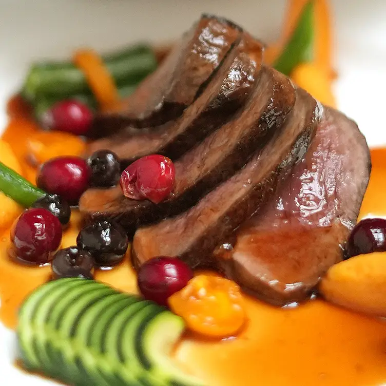 Saucy and colourful duck dish in Old Montreal - Bonaparte QC Montréal