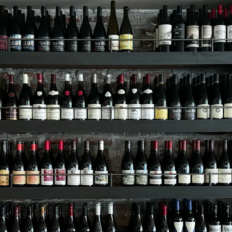 Our wine wall is stocked with over 300 wines. - Purple Cafe and Wine Bar - Stone Way，WASeattle