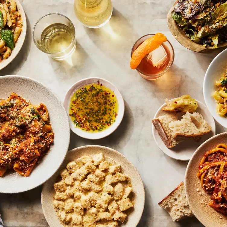 A spread of home made pasta, cocktails, and wine - MIDA - Fenway MA Boston