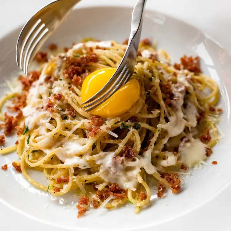 Spaghetti Carbonara, a signature Coppa dish - Coppa Osteria, Houston, TX