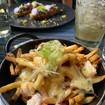 A photo of Butter Braised Lobster Poutine of a restaurant