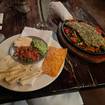 A photo of Green Pipián Seared Trout Fajitas of a restaurant