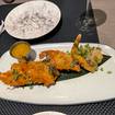 Una foto de Crunchy Coconut Shrimp de un restaurante
