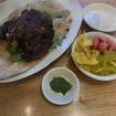 Une photo de Slow Roasted Lamb Neck Shawarma d'un restaurant