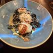 Una foto de Fettuccine Nero de un restaurante