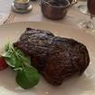 A photo of New York Strip of a restaurant