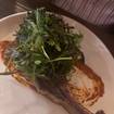 Una foto de Dry Aged Pork Chop de un restaurante