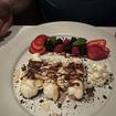 Una foto de Cannoli de un restaurante