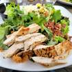 Una foto de Tuscan Grilled Chicken Club Salad de un restaurante