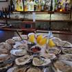 A photo of $1 Oysters with a Main Course of a restaurant