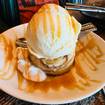 A photo of Croissant Bread Pudding à la Mode of a restaurant