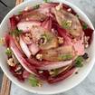 A photo of grilled onion & endive salad of a restaurant