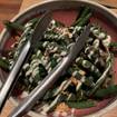 A photo of sautéed green beans of a restaurant