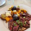 A photo of Peppered Elk Medallions of a restaurant