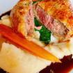 Una foto de Beef Wellington de un restaurante