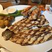 Una foto de Wood-Grilled Idaho Rainbow Trout de un restaurante