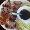 Een foto van Roasted Peking Duck van een restaurant 