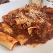 A photo of Rigatoni Bolognese of a restaurant