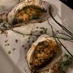 A photo of GRILLED OYSTERS of a restaurant