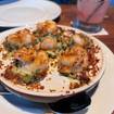 Una foto de Lump Crab And Shrimp-Stuffed Mushrooms de un restaurante