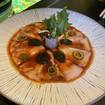 Una foto de Yellowtail Sashimi de un restaurante