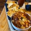 Una foto de Baked Cheesy Crab Dip de un restaurante