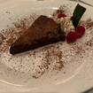 A photo of Flourless Chocolate Espresso Cake of a restaurant