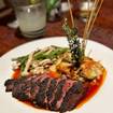 A photo of Buffalo Flank Steak of a restaurant