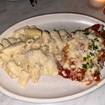 Una foto de Chicken Parmesan de un restaurante