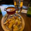 Una foto de Tomato Basil Fondue & Grilled Cheese de un restaurante