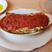 Una foto de Lasagna Pink Door de un restaurante