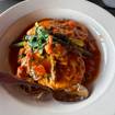 A photo of Chicken Maximo of a restaurant