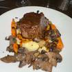 A photo of Beef Short Rib Bourguignonne of a restaurant