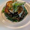 Una foto de Brick Oven-Roasted Chilean Sea Bass de un restaurante