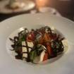 レストランのCaprese Salad​の写真