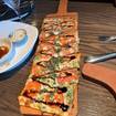 A photo of Caprese Flatbread of a restaurant