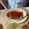 Una foto de Lasagna Pink Door de un restaurante