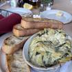 A photo of Warm Artichoke Spinach Dip of a restaurant