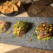 A photo of Tuna Tartare Trilogy of a restaurant