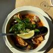 A photo of Cioppino Pink Door of a restaurant