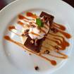 Una foto de Dark Chocolate Pecan Tart de un restaurante