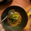 A photo of pork belly okonomiyaki of a restaurant