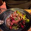 A photo of skirt steak chilaquiles of a restaurant