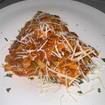 Una foto de Lasagna Bolognese de un restaurante