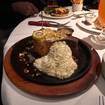 Una foto de Dinner-Cut Pork Chop de un restaurante