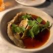 A photo of Short Rib Potstickers of a restaurant