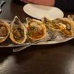 Una foto de Broiled Oysters de un restaurante