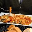 Una foto de Chicken Parmesan de un restaurante